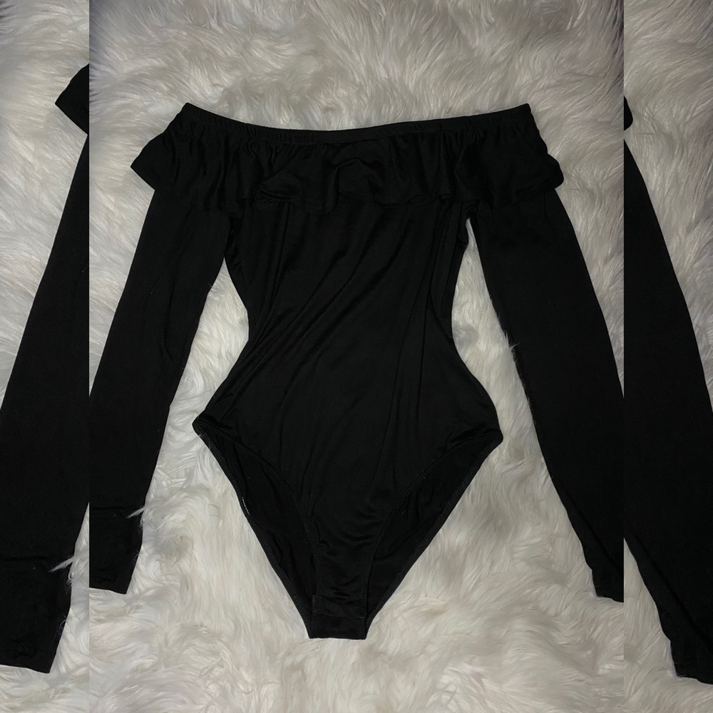 Off the shoulder long sleeve one piece.